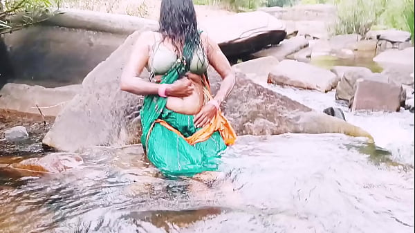 Villege aunty outdoor water fall bathing. Telugu dirty talks.