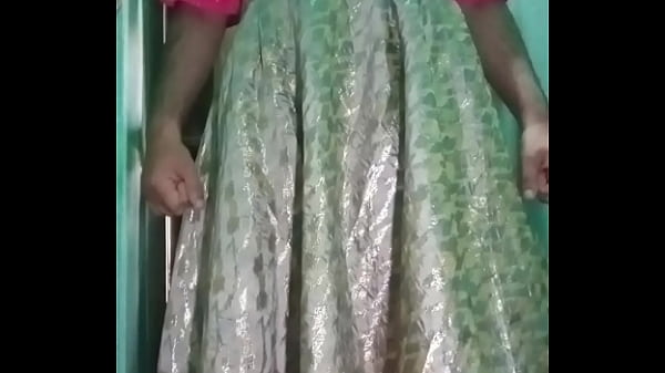 Indian Gay Crossdresser Gaurisissy in Pink lehanga pressing his Boobs and fingering in his ass